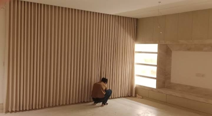 Floor-to-ceiling custom curtains in a Riyadh villa — bespoke curtain installation